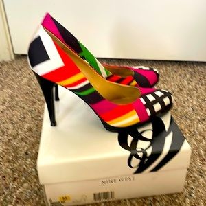 Nine West Rocha Pump size 8 w/ 4 inch heel /1/2 inch platform. Never worn